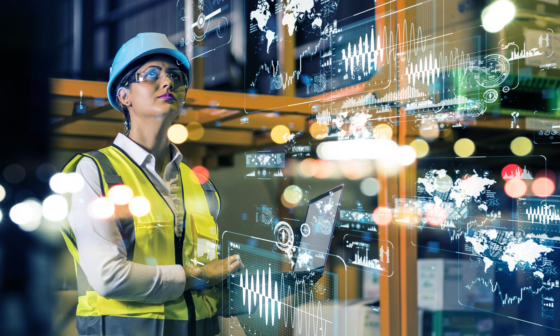 Engineer analyzing data with digital interface.