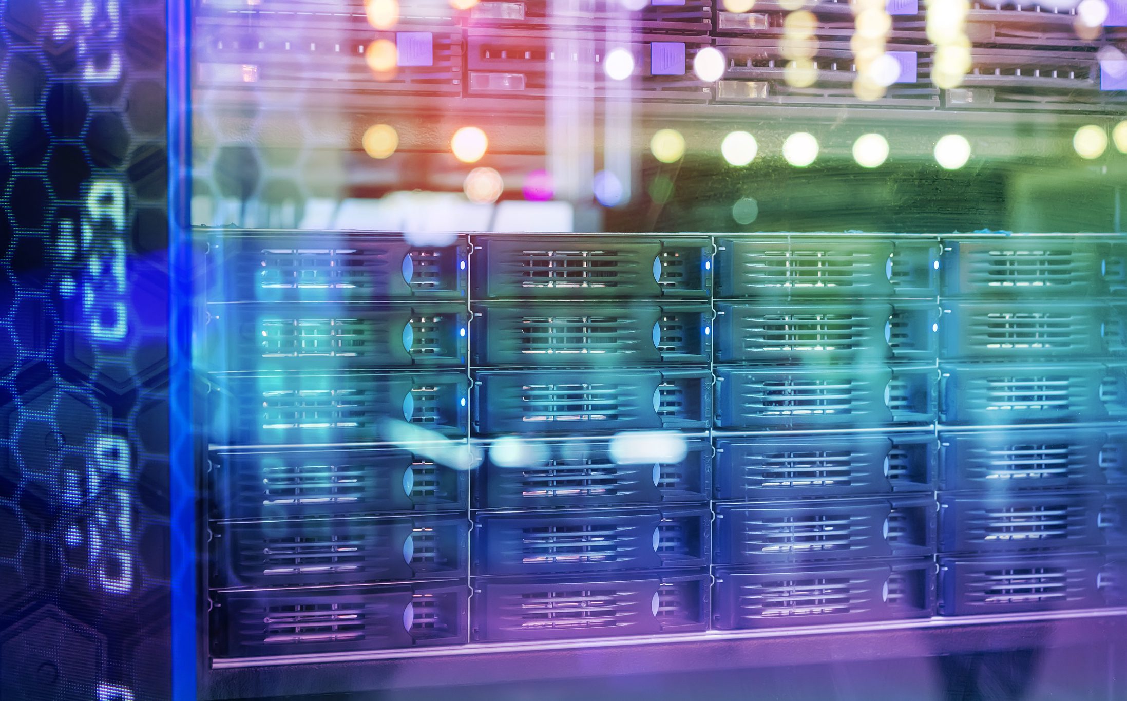 Colorful server racks with digital overlay.