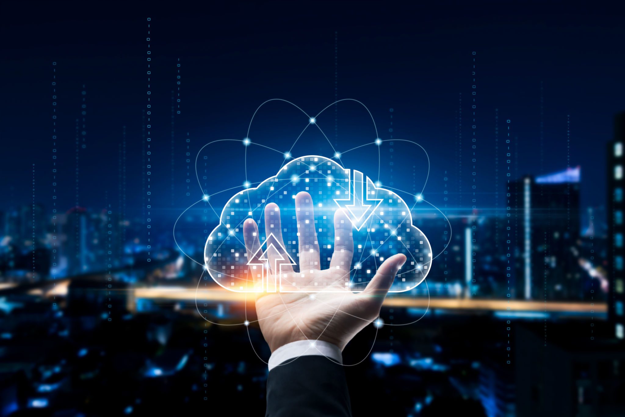 Hand reaching towards digital cloud icon.